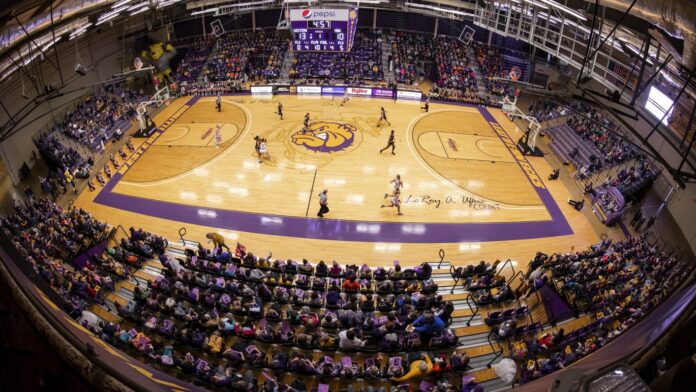 The Western Illinois University Leathernecks men’s and women’s basketball teams, who typically play home games on their WIU home court in Macomb, will tip off at the Mark of the Quad Cities on Dec. 16.